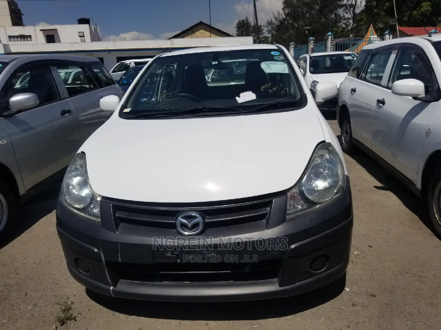 Mazda Familia 2014 Pearl