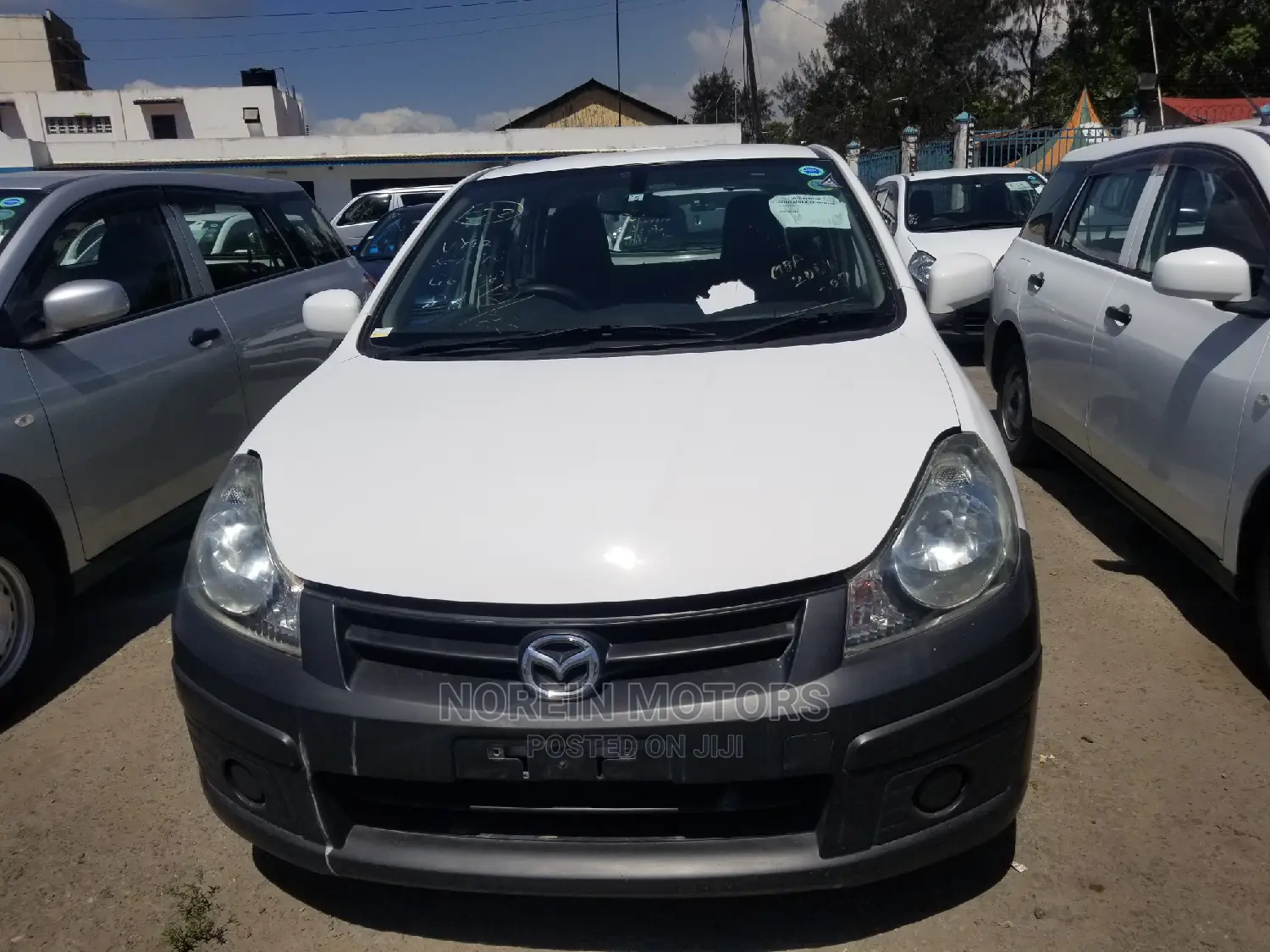 Mazda Familia 2014 Pearl