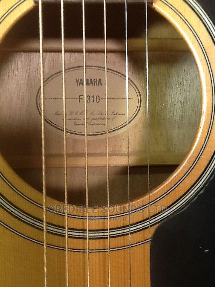 Yamaha F310 6Strings Acoustic Guitar in Nairobi Central Musical
