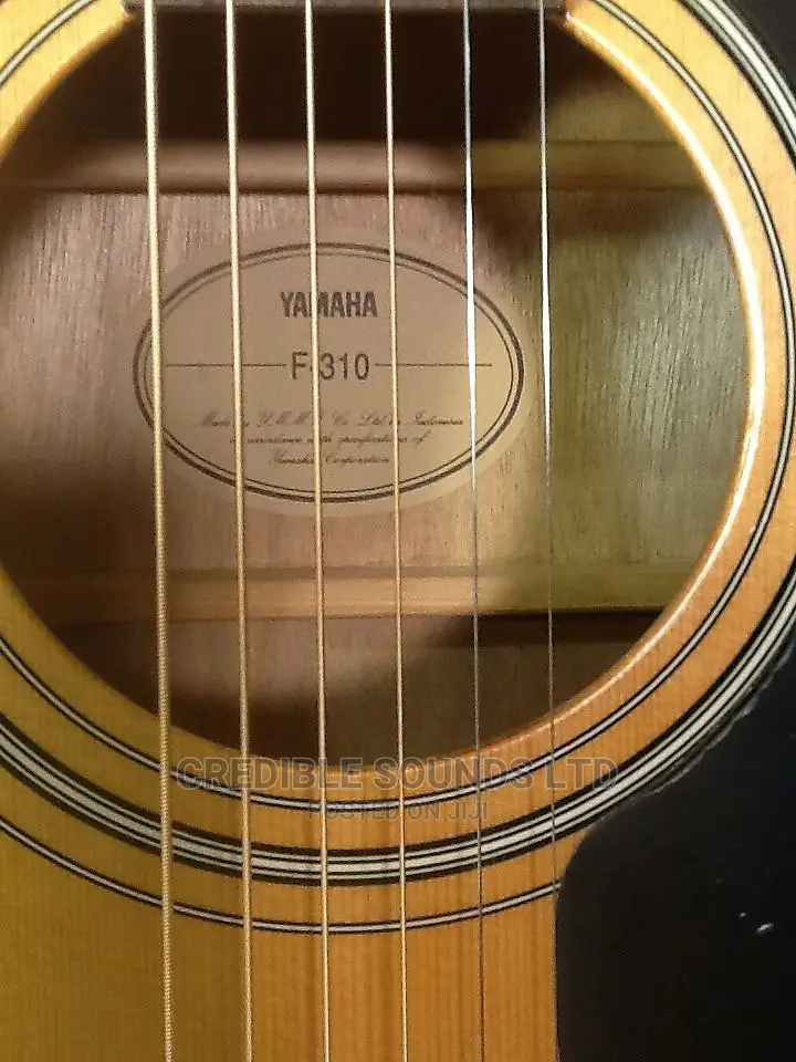 Yamaha F310 6Strings Acoustic Guitar in Nairobi Central Musical