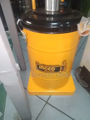 Yellow Greasing Machine