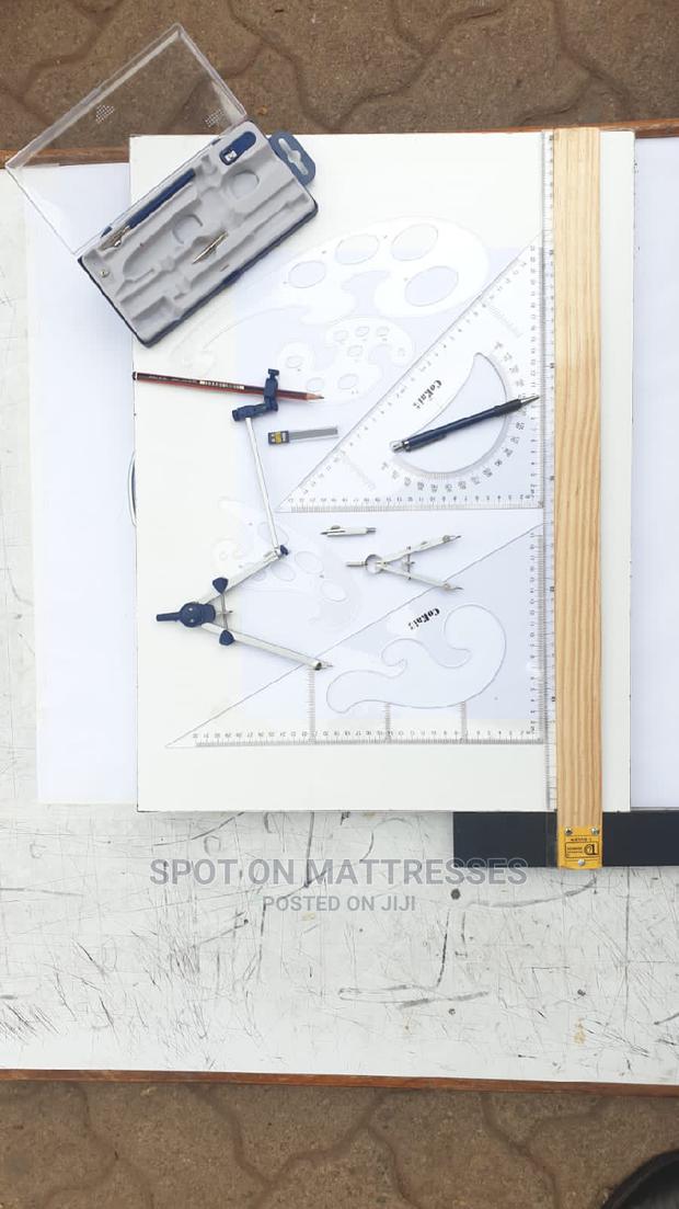 Drawing Set of Compasses on a Drawing Board - main view