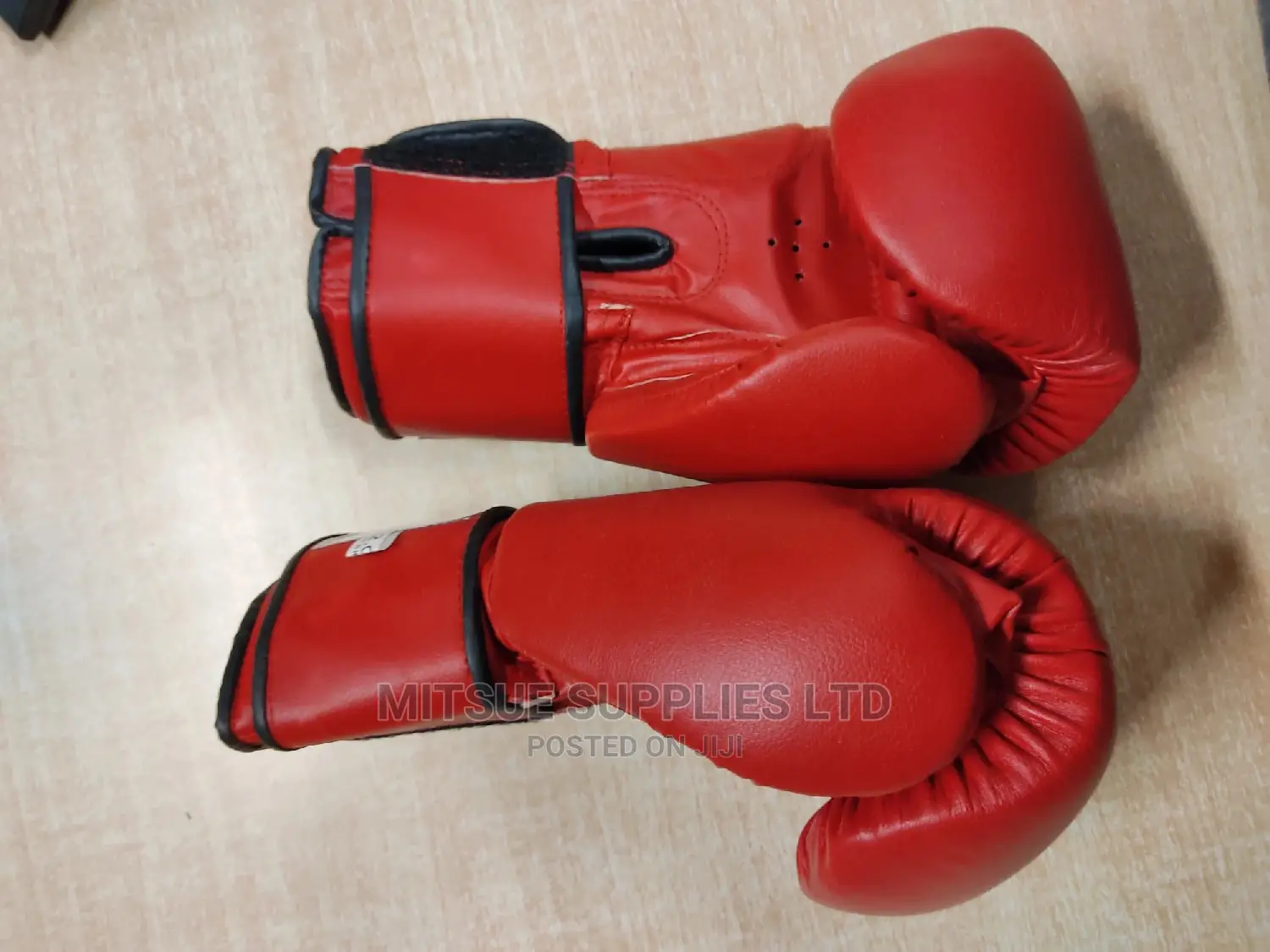 A Pair of Leather Boxing Gloves 12oz Red