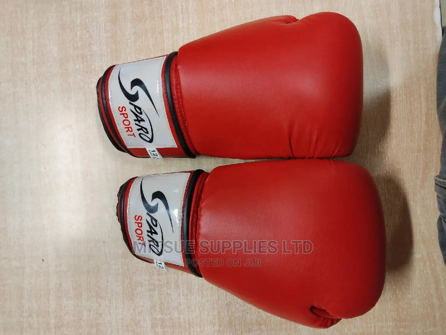 A Pair of Leather Boxing Gloves 12oz Red