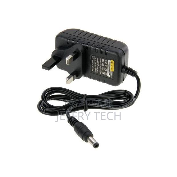 UK Plug AC 100-240v to DC 12V 1A Power Adapter