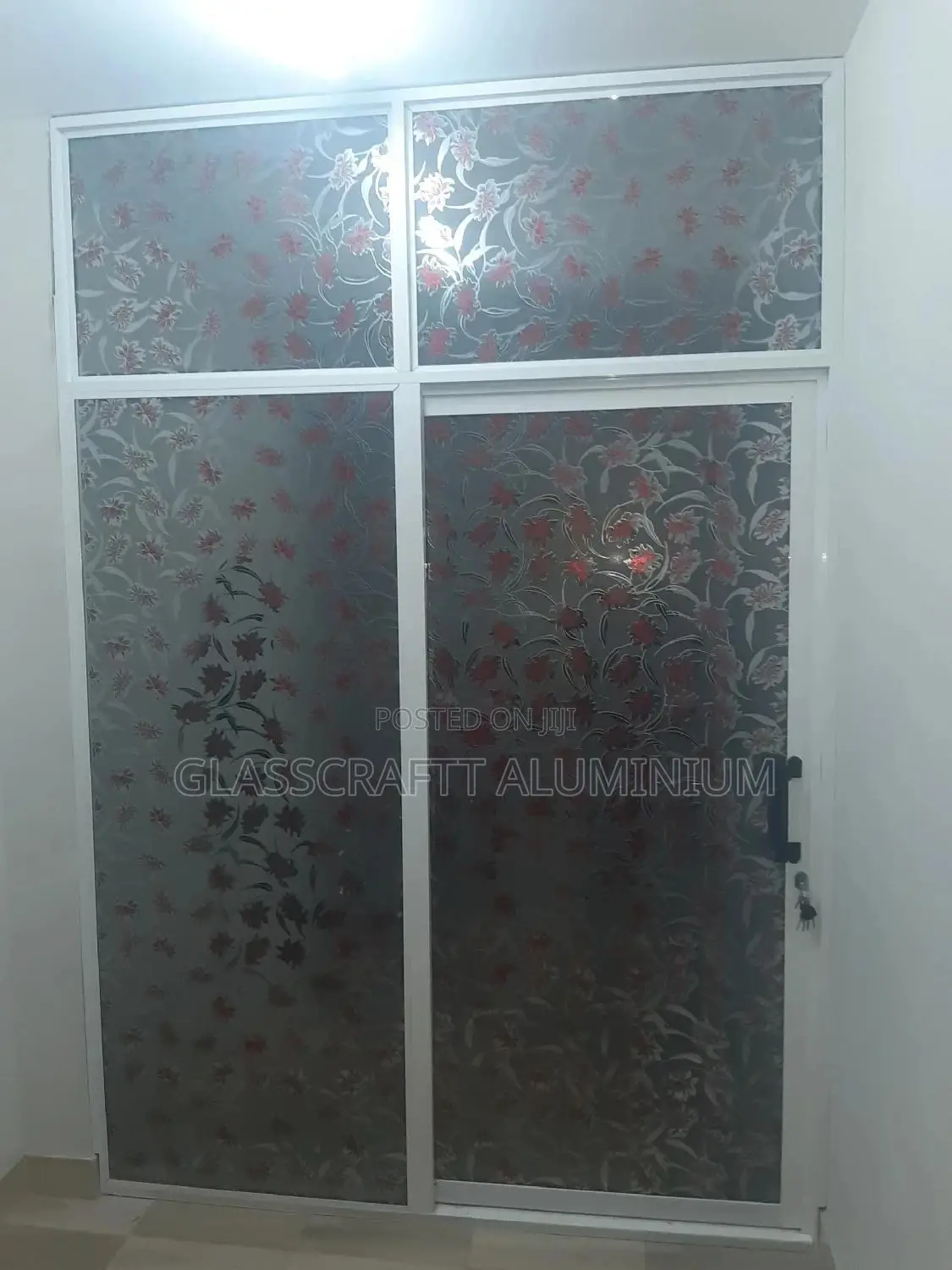 Red Lily Glass Completes an Aluminium Door