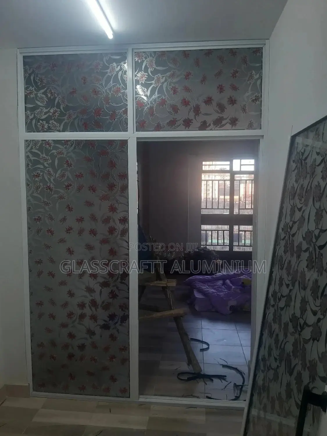 Red Lily Glass Completes an Aluminium Door