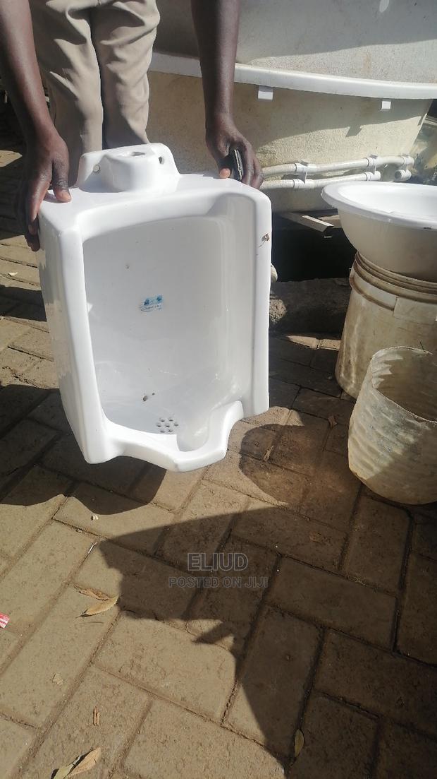 Milky White Urinal Bows