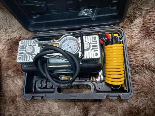 Air Compressor With Repair Puncture Tool