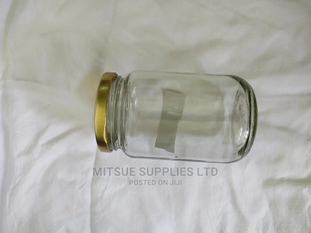 A Box of 48 Koleman Glass Jar- 470ml With Gold Lids
