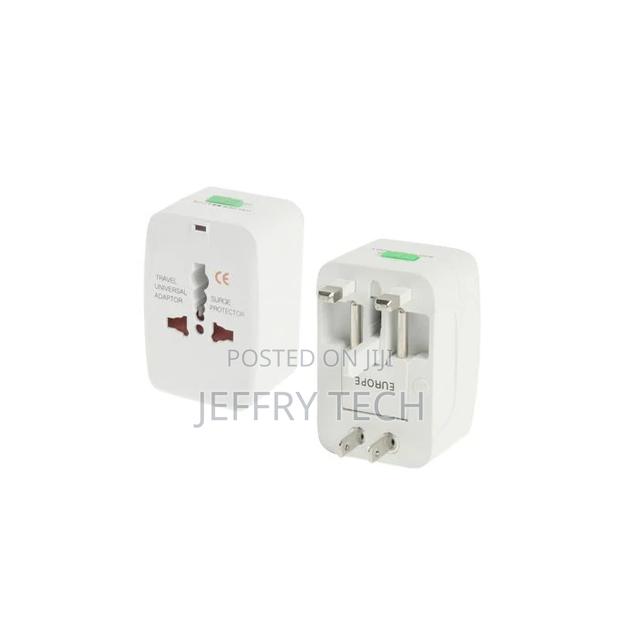 All in 1 (EU + AU + UK + US Plug) World Universal Travel Ada