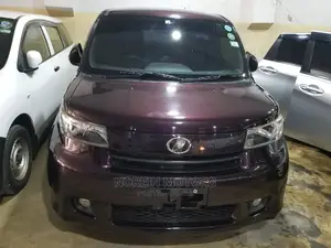 Purple Toyota bB 2014 - Compact Car Packed with Personality