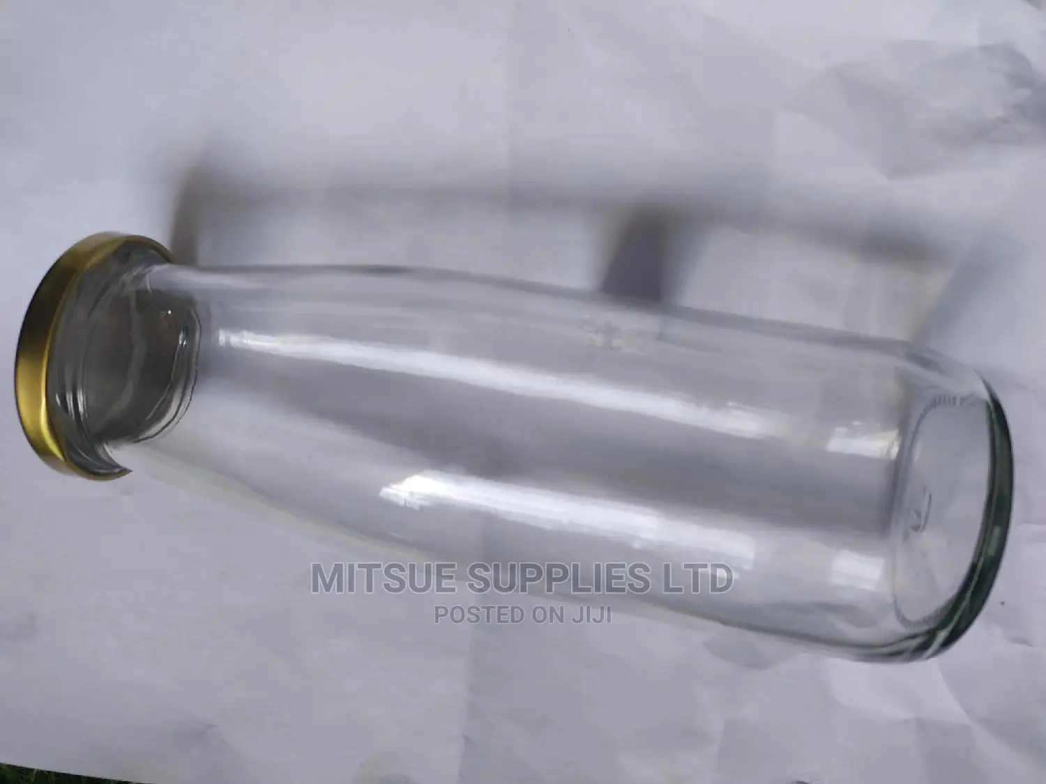 A Box of 50 Camel/Milk/Juice Glass Jars-495/500ml With Lids
