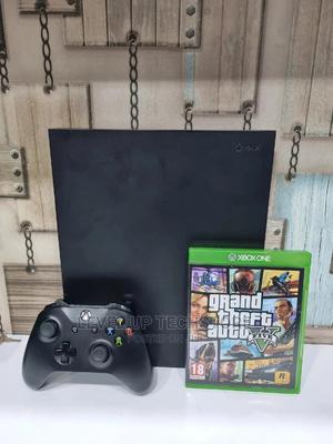 Xbox One X 1TB Console System With 1 Game - Slightly Used - main view