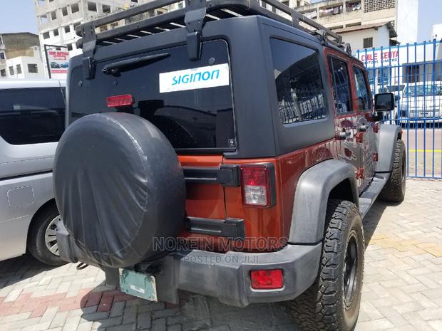 Jeep Wrangler 2014 Orange - thumbnail 9