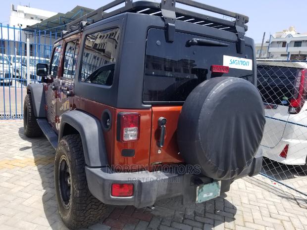 Jeep Wrangler 2014 Orange - thumbnail 11