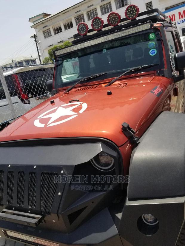 Jeep Wrangler 2014 Orange - main view