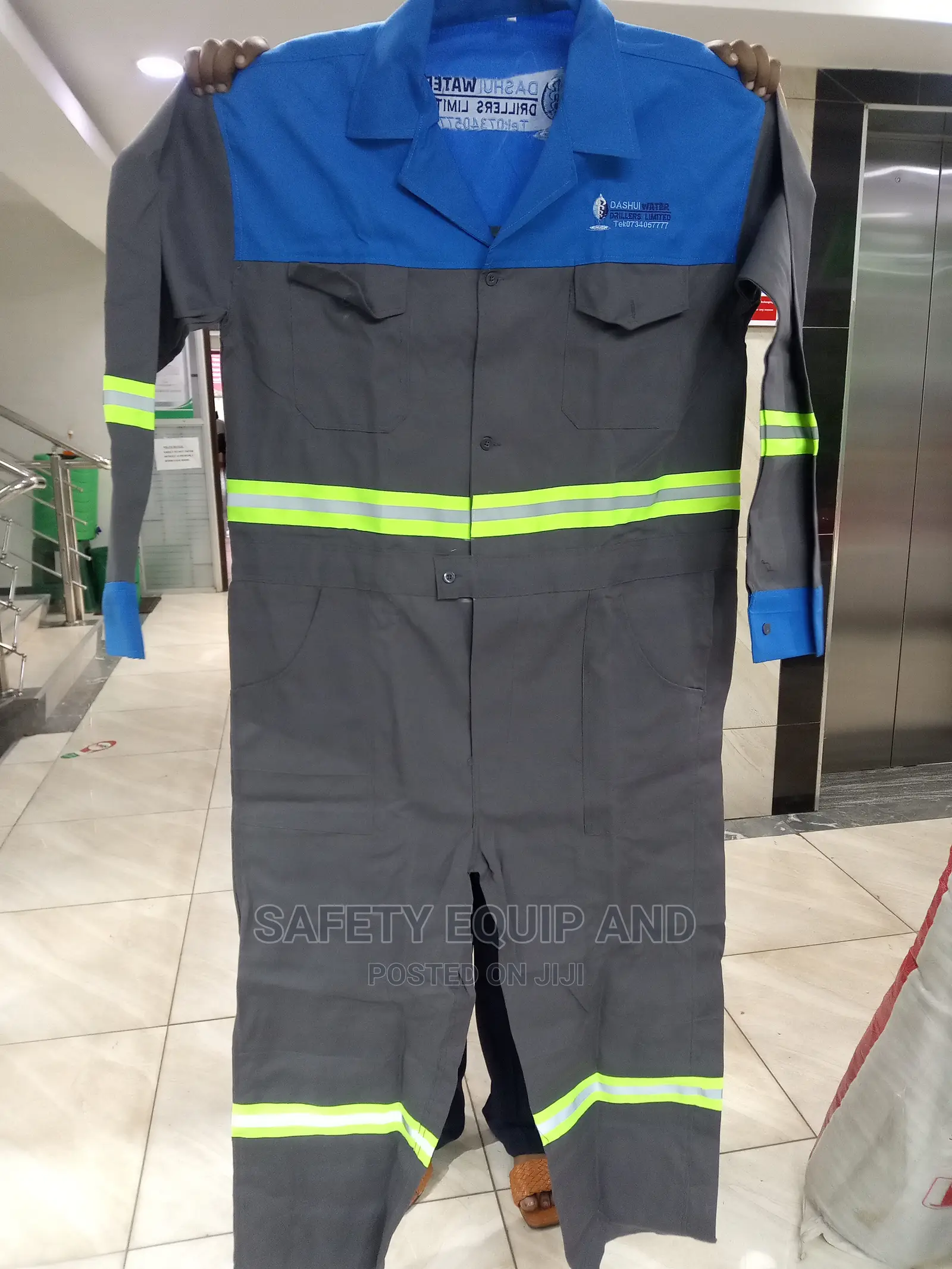 Grey Pants With Blue Top-Reflector