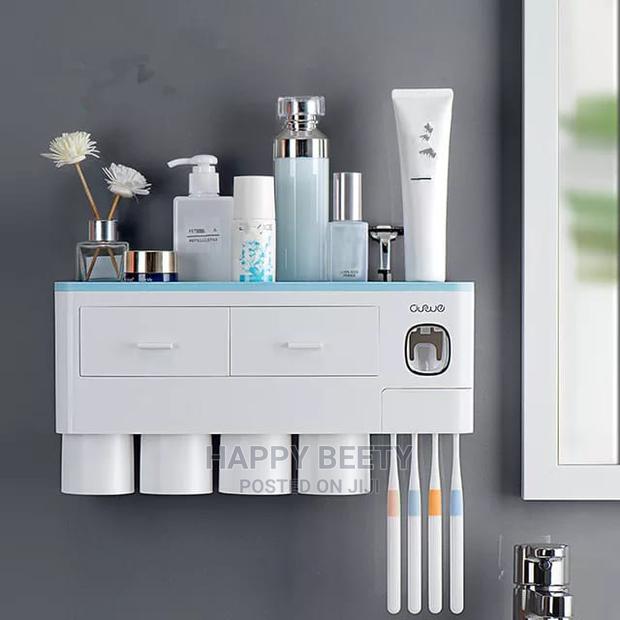 #Toothpaste Dispenser With Toothbrush Holder