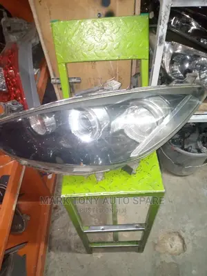 Demio 08 Zenon Headlight