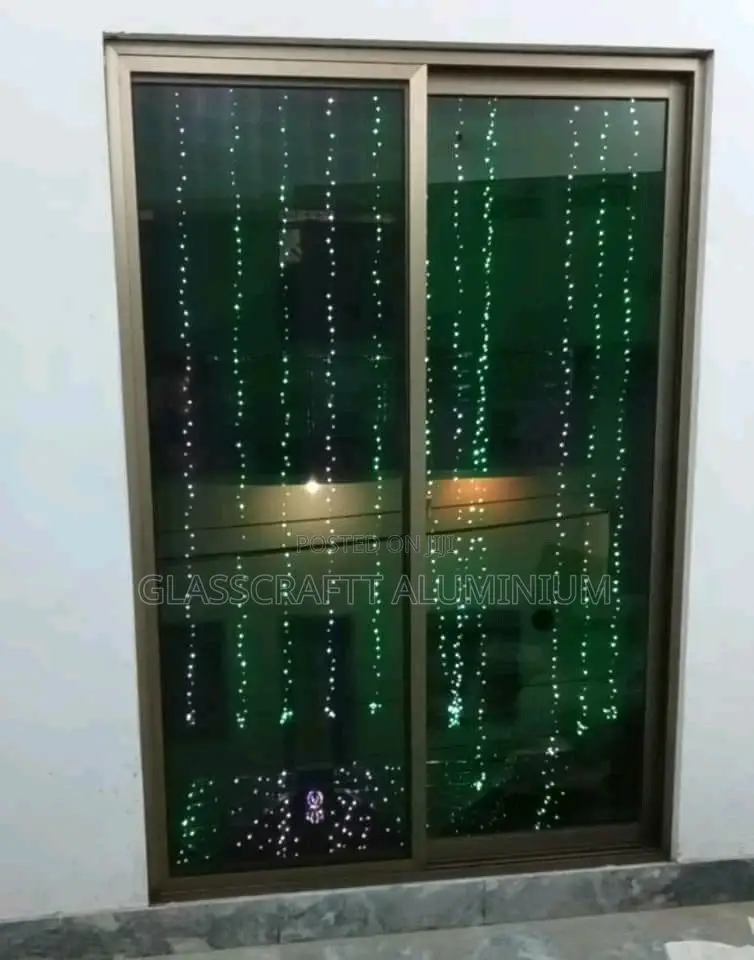 Wide Champagne Aluminium Windows