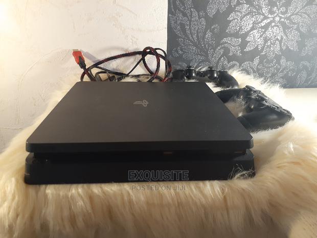 Playstation 4 SLIM (2 FREE GAMES) - thumbnail 2