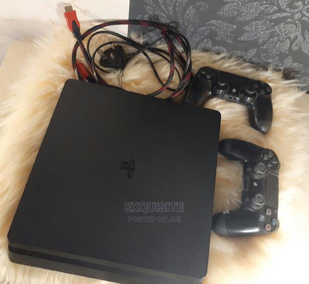 Slightly Used 500gb PS4 Slim( 2 Games Included) - main view