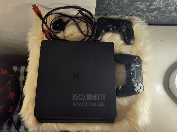 Slightly Used 500gb PS4 Slim( 2 Games Included) - thumbnail 4