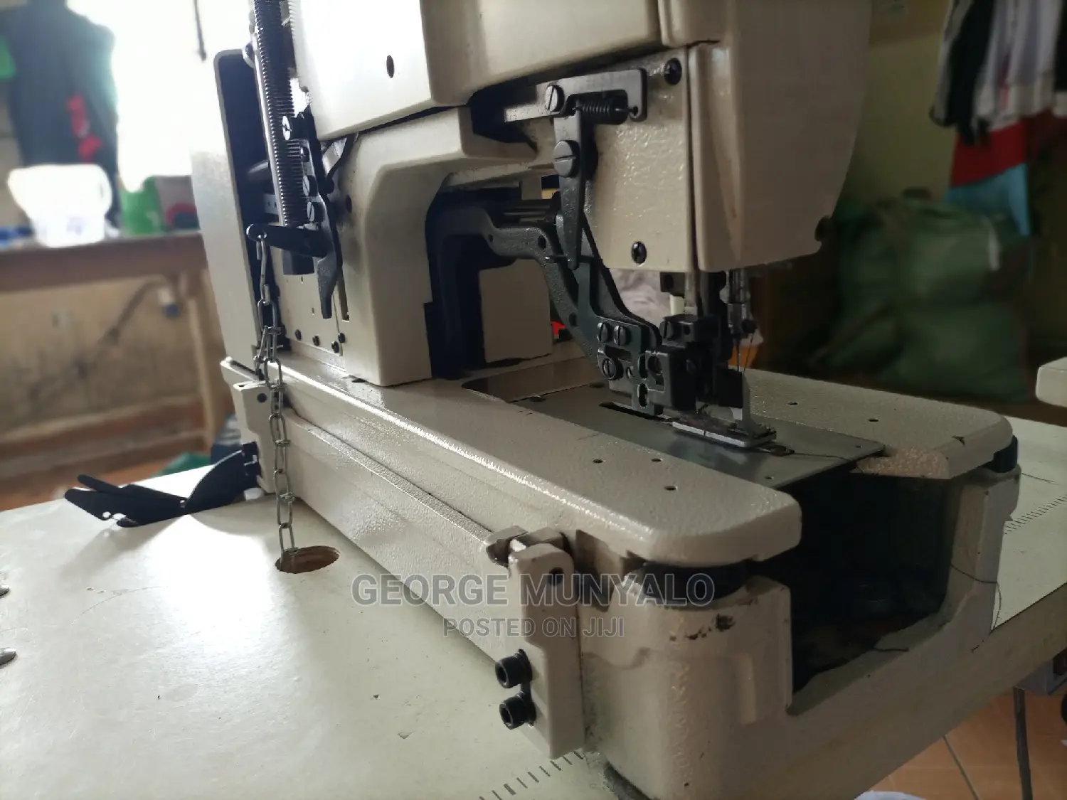 Button-Holing Sewing Machine