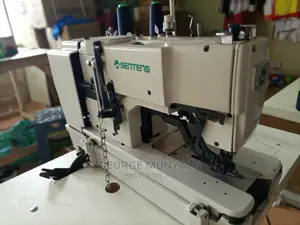 Button-Holing Sewing Machine