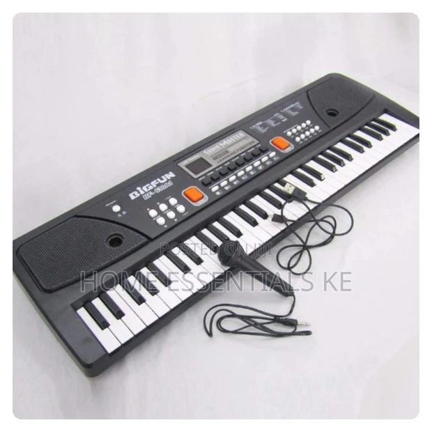 49 Keys Electric Piano With a Microphone