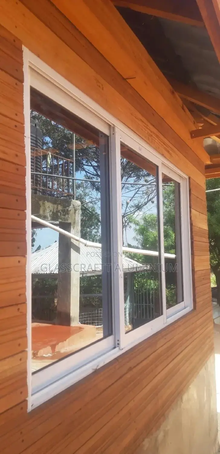 Bronze One Way Aluminium Windows