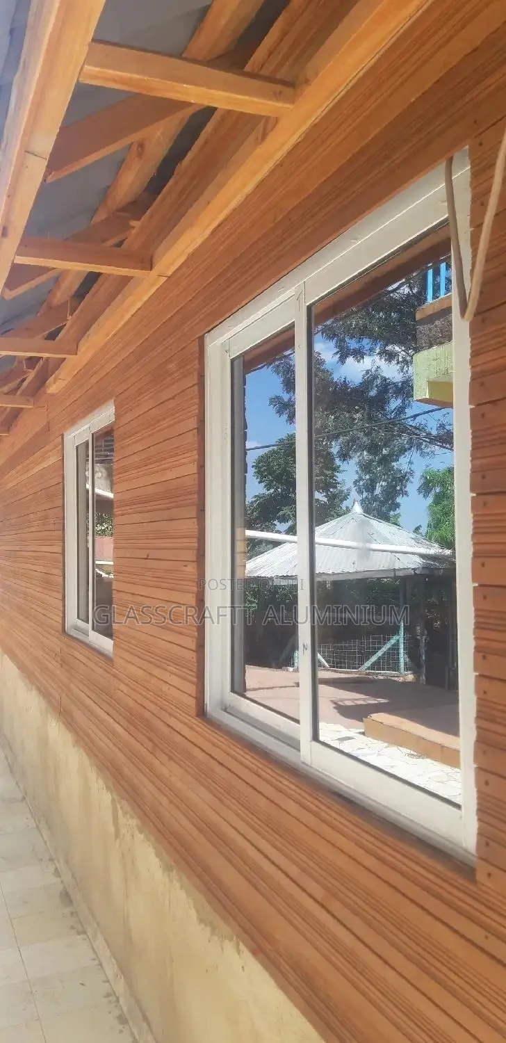 Bronze One Way Aluminium Windows