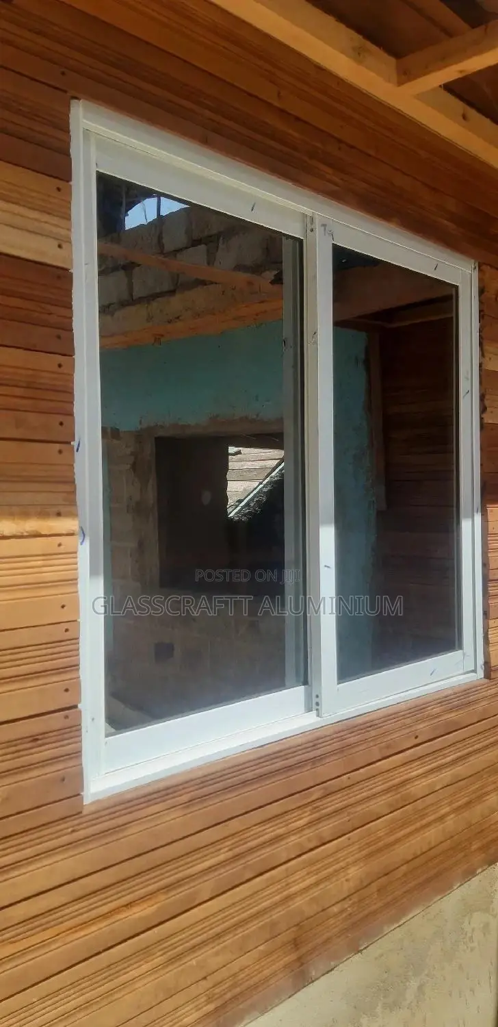 Bronze One Way Aluminium Windows