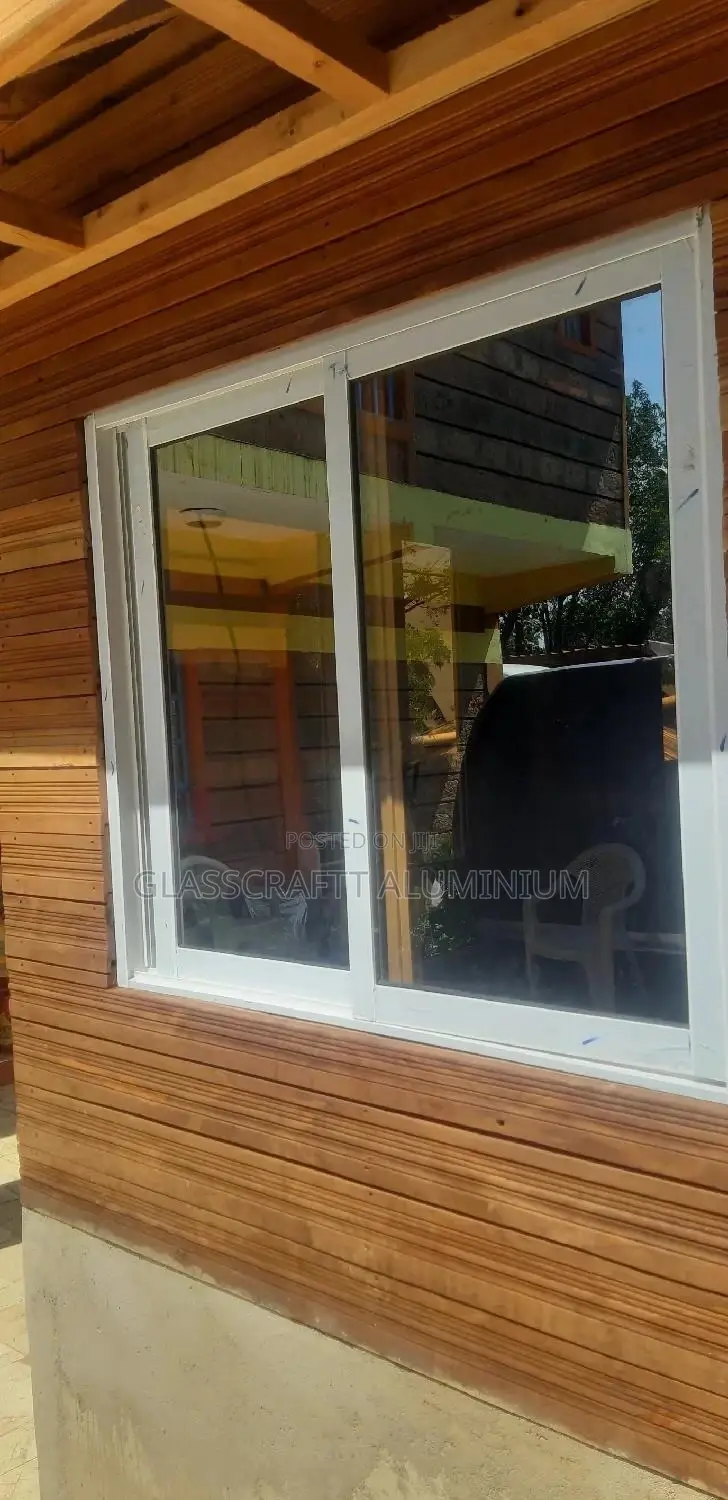 Bronze One Way Aluminium Windows