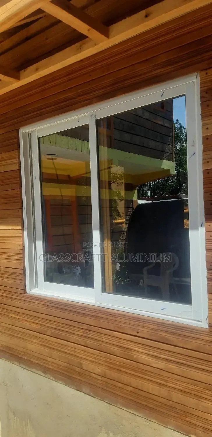 Bronze One Way Aluminium Windows