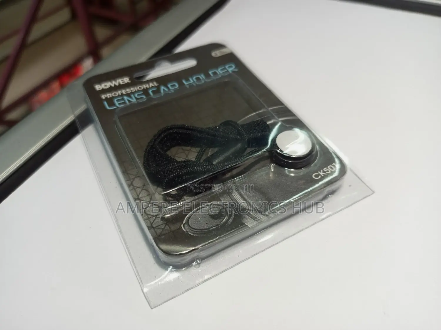 Lens Cap Holder for Cameras