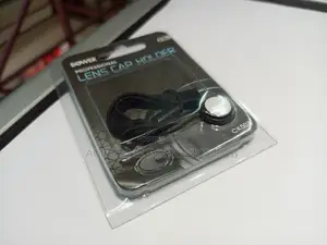 Lens Cap Holder for Cameras