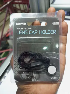 Lens Cap Holder for Cameras