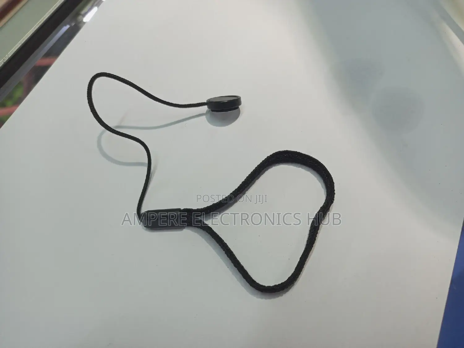 Lens Cap Holder for Cameras