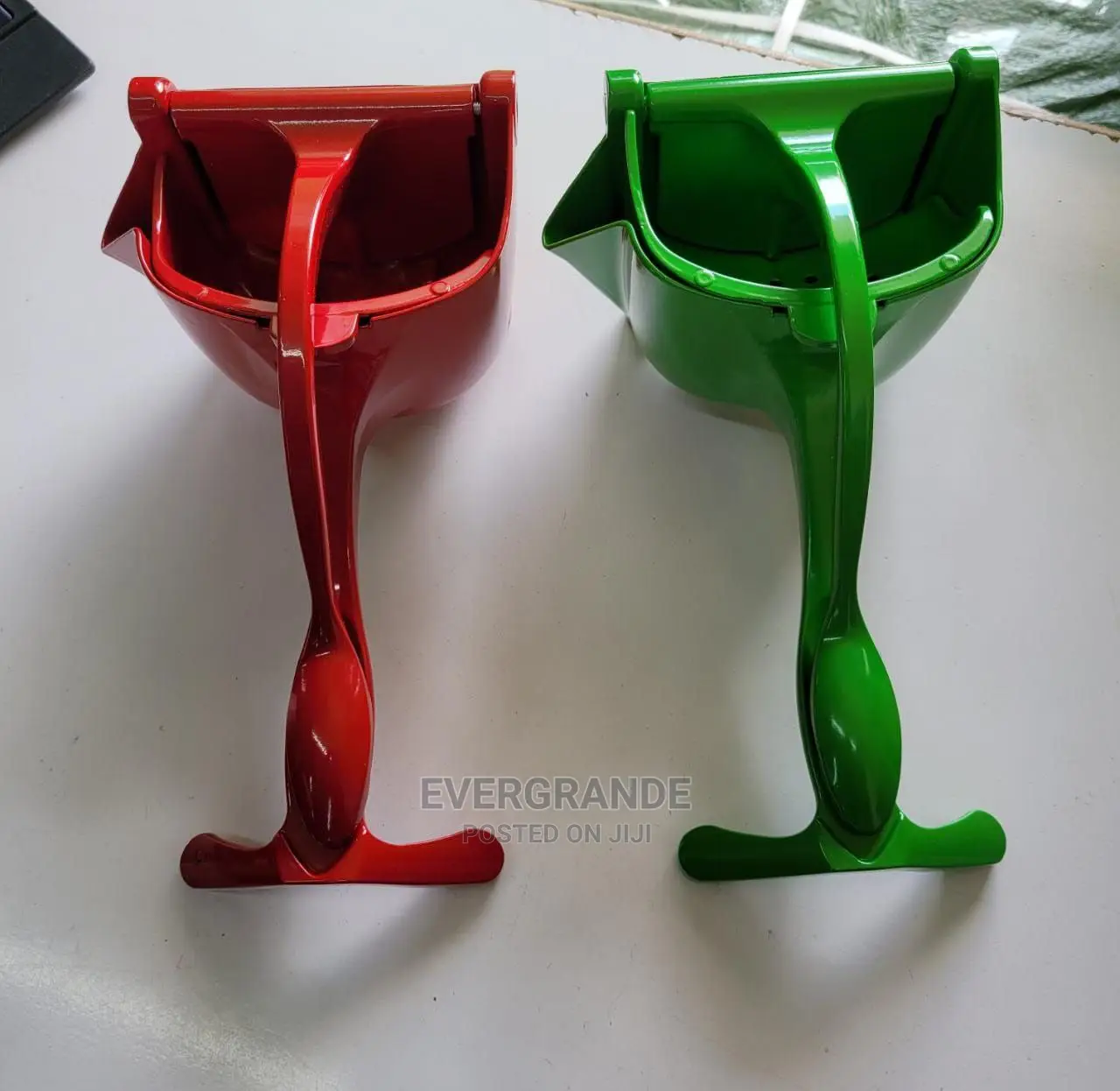 Metallic Fruit Presser
