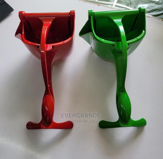 Metallic Fruit Presser