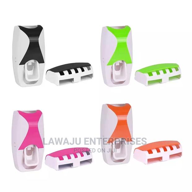 Toothpaste Dispenser + Toothbrush Holder - thumbnail 2