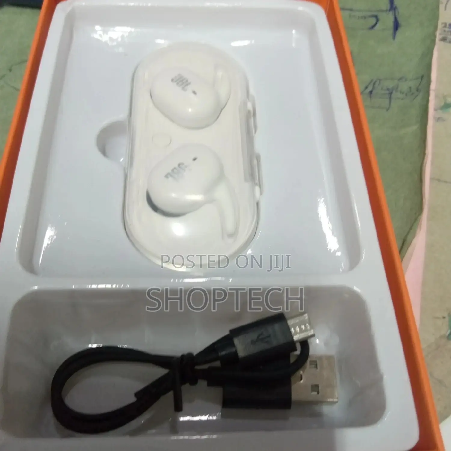 Black and White JBL Pods