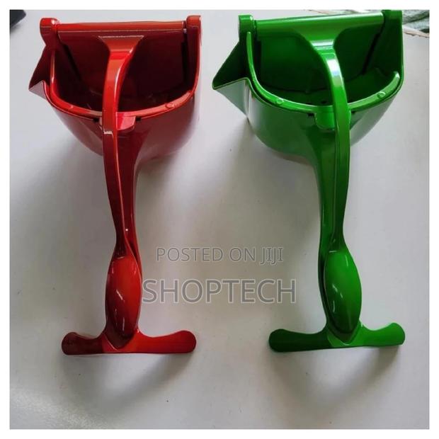 Metallic Fruit Press.