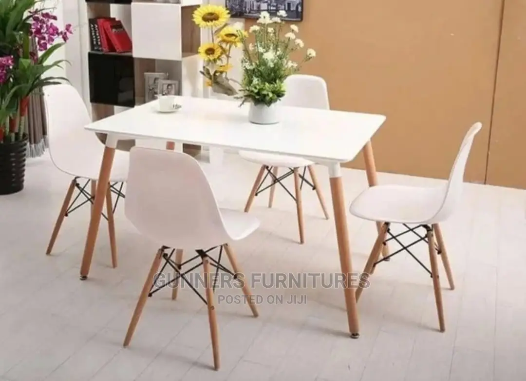Eames Table and 4 Eames Chairs.