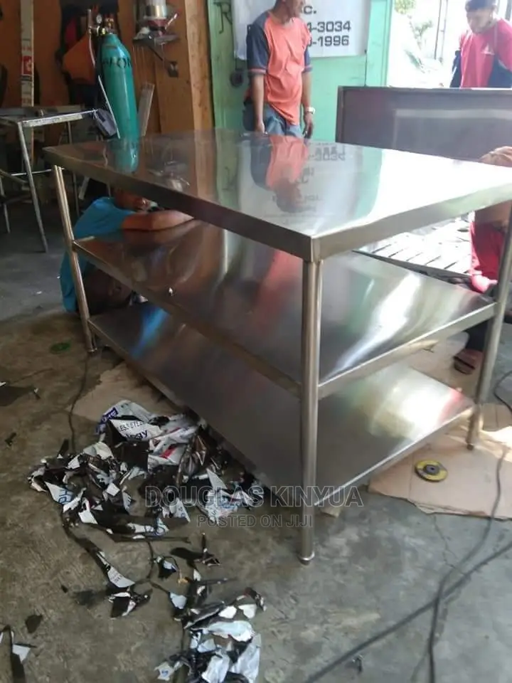 Stainless Steel Working Table/Top With Extra Shelf.