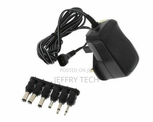 Universal AC/DC Mains Power Adaptor Plug Charger 3v - 12v Ou