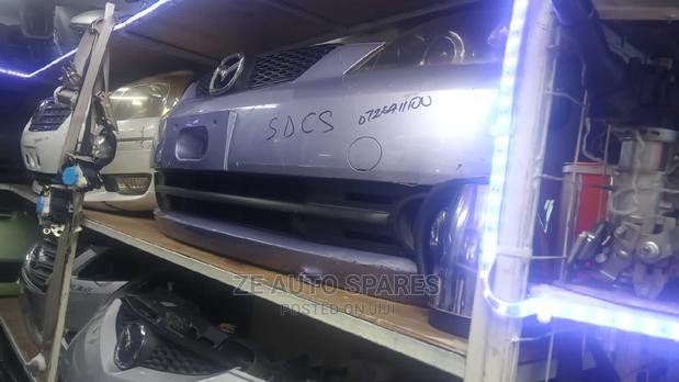 Demio 2005 Nosecut Xenon Headlights Clear