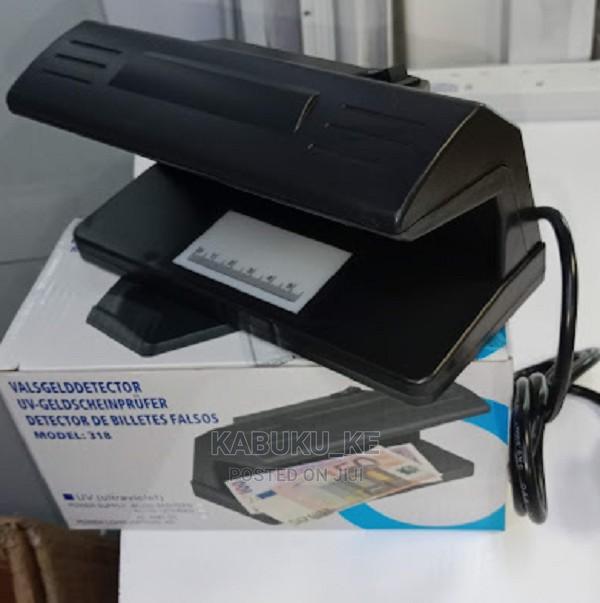 Ideal Counterfeit Money Detector Model